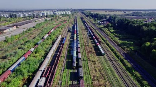 Aerial View of Trains on Rural Railroad Tracks