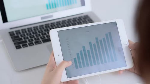 Data Analysis on Tablet at White Desk