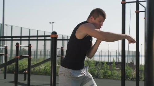 Young Adult Boxing Outdoors in Daytime