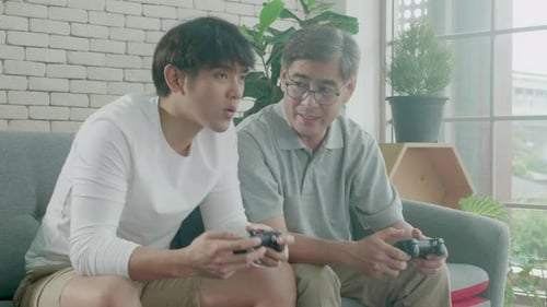 Young Adult and Adult Playing Video Games