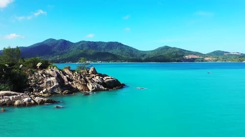 Aerial above nature of beautiful sea view beach lifestyle by blue sea and white sandy background of