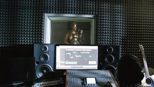 Singer Recording New Song in Studio