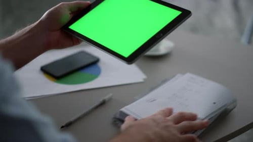 Man Hands Using Tablet Device Green Screen Research Business Finance in Office
