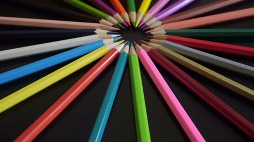 Colored Pencils On A Black Background 7.
