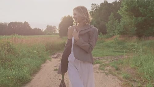 Woman Hiking Outdoors. Woman Walking on Rural Road. , UHD