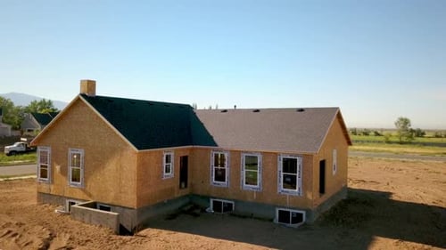 Aerial View of a New House Under Construction
