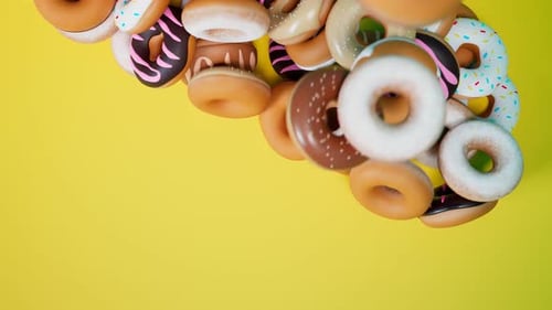 Animated 3D Donuts Falling and Scattering