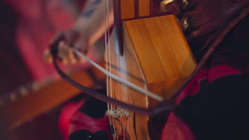 Folk Music Band Participant Plays Igil at Tribal Concerts