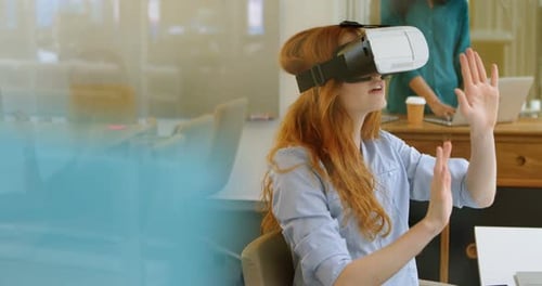 Woman Experiencing Virtual Reality in Modern Office