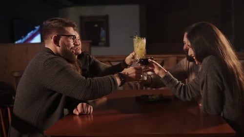 Happy Friends Meet in a Restaurant