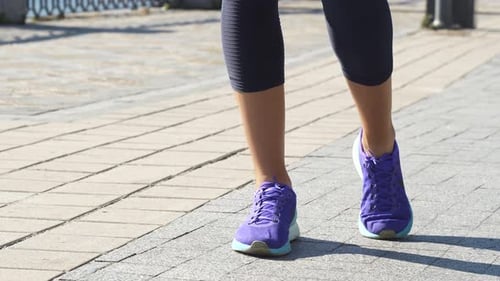 Legs and Running Shoes Warming Up