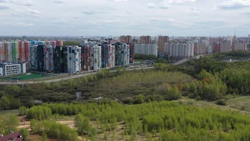 Approaching to Modern Moscow Highrise Buildings Near Forest