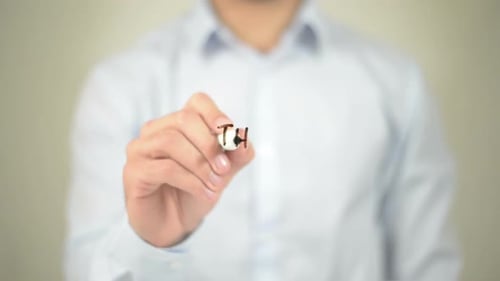 Hand Writes Think Different on Clear Surface