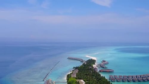 Aerial texture of coastline beach by blue ocean with sand background
