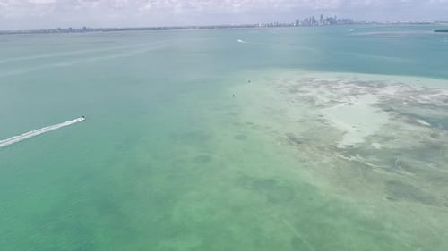 Miami Aerial Following Boat Towards City