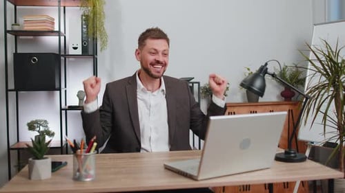 Business Man Winner Working Browsing Typing on Laptop at Office Celebrate Big Lottery Win Good News
