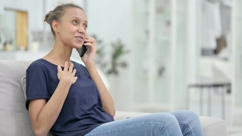 Woman on Cell Phone Talking Indoors