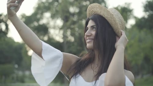 Side View Portrait Cheerful Young Beautiful Middle Eastern Woman Taking Selfies Smartphone