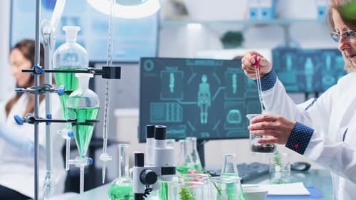 Close Up Shot of Female Chemist Making Experiment on Plants