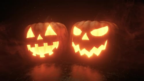 Halloween Jack-o'-Lantern Pumpkins with Glowing Faces and Smoke