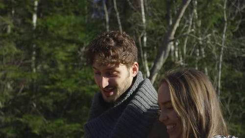 Couple walking in a forest