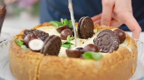 Close Up Female Confectioner Hands Chopping Baking Cheesecake