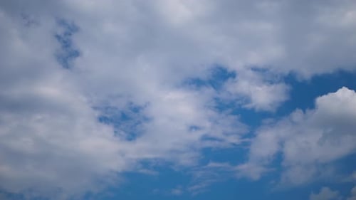 Blue Sky with Fluffy White Clouds