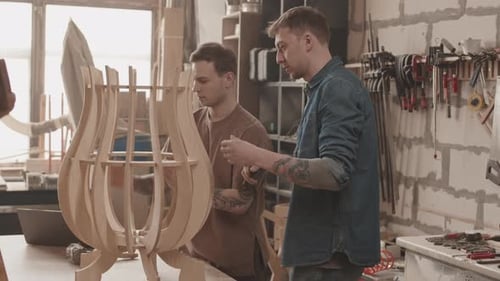 Woodworkers Finishing Project in Workshop