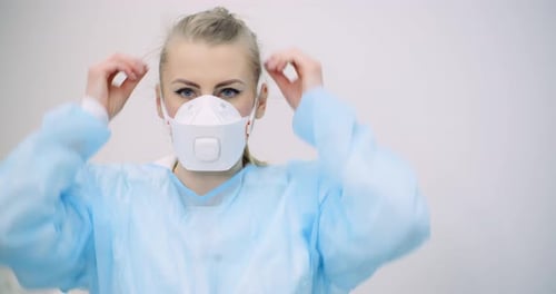 Portrait of Doctor Wearing Protective Mask in Hospital. Covid-19 Coronavirus