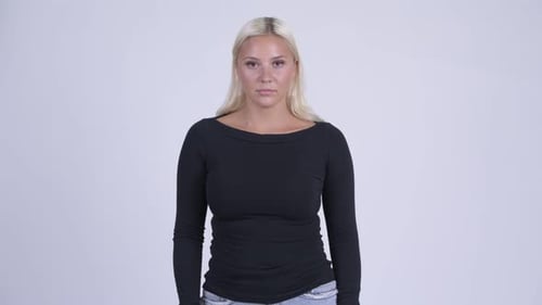 Studio Shot of Young Beautiful Blonde Woman