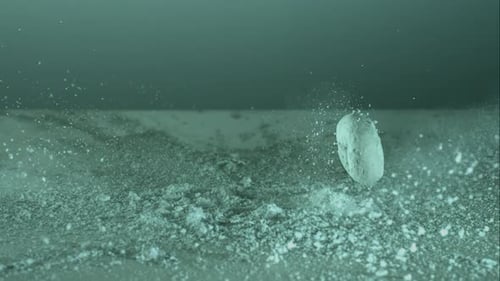 Doughnuts falling and bouncing in ultra slow mo 1500fps - reflective surface - DOUGHNUTS PHANTOM 008