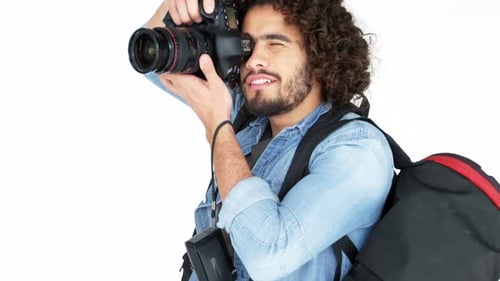 Photographer with Curly Hair Using Professional Camera