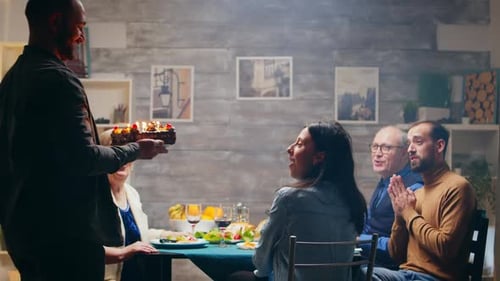 Woman Receives Birthday Cake From Loving Family