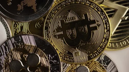 Rotating shot of Bitcoins (digital cryptocurrency) - BITCOIN MIXED
