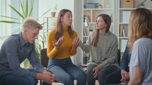 Woman Shares Story in Group Therapy Session