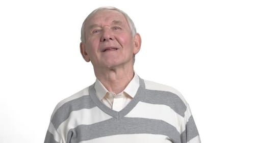 Smiling Senior Man Wearing Gray and White Sweater