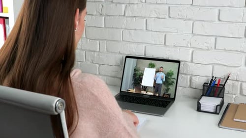 Young Adult Attends Online Class