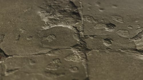 Slow Motion Camera Pan Over Rough Natural Stone Texture