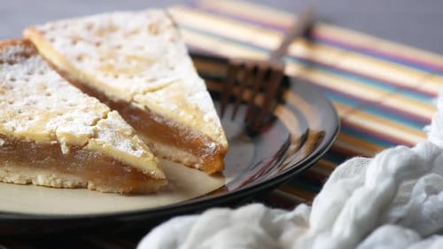 Tasty Slices of Apple Pie Sprinkled with Sugar