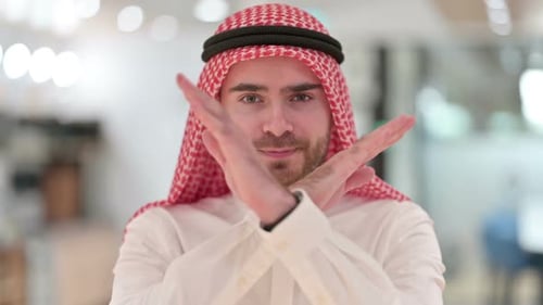 Man in Keffiyeh Gestures No