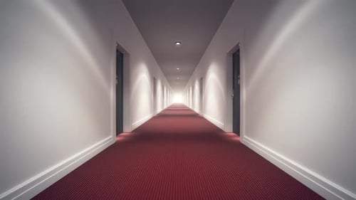 Mystery empty hotel corridor with red carpet, white walls and wooden doors.