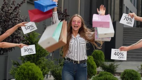 Inscriptions with Discounts Appears Next To Smiling Girl with Shopping Bags. Low Prices Shopping