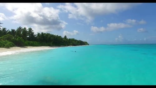 Aerial flying over sky of tranquil bay beach holiday by clear ocean with white sand background of a
