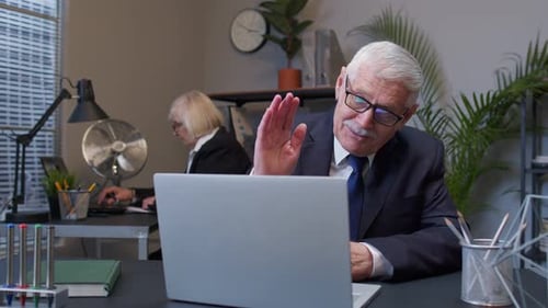 Business Man Using Laptop Internet Online Meeting Conference in Office Webinar Talking on Webcam