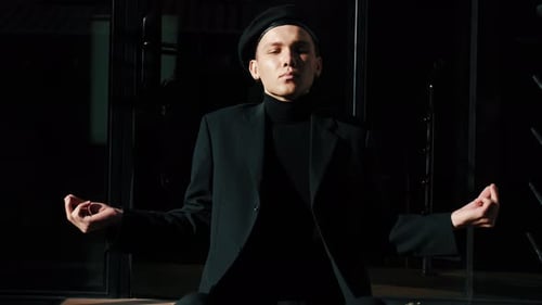 Stylish Young Startup Businessman Meditating Yoga Outside Urban Office During Work Break