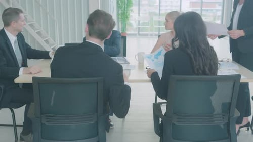 Business Meeting and Collaboration in Modern Office
