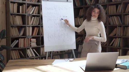 Hispanic School Teacher Giving Online Class By Computer Webcam Zoom Video Call