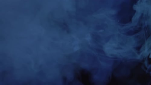 Flowing Blue Smoke on Black Background