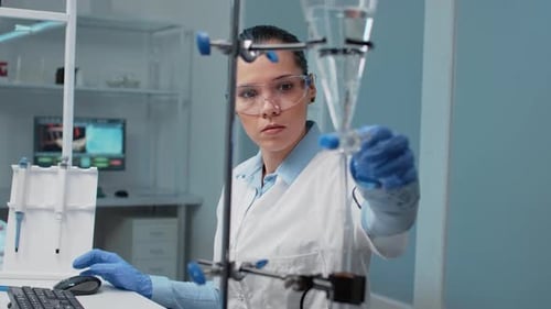 Researcher Working with Scientific Laboratory Equipment