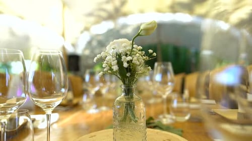 Elegant Wedding Table Setting with White Flowers